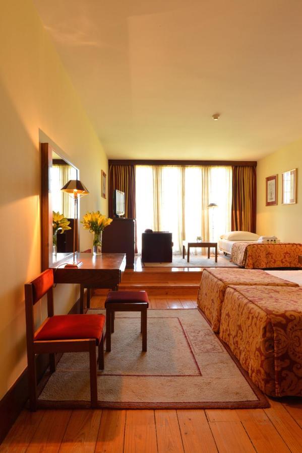 Pousada Mosteiro De Guimarães Kültér fotó A room at the hotel